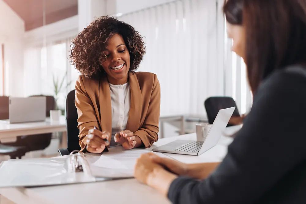 Insurance agent talking with person